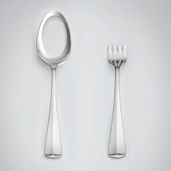 A picture of a spoon with a huge hole in it and a fork with super short tines
